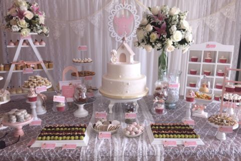 mesa de dulces para eventos religiosos